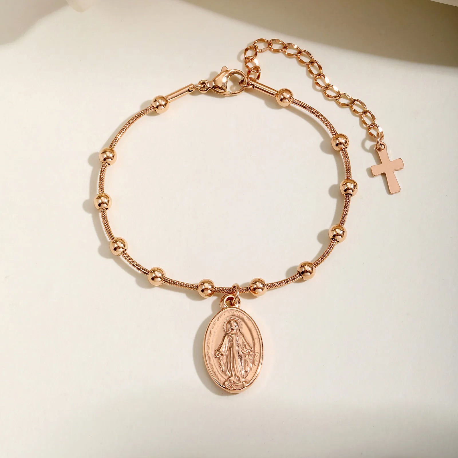 Bracelet croix or rose
