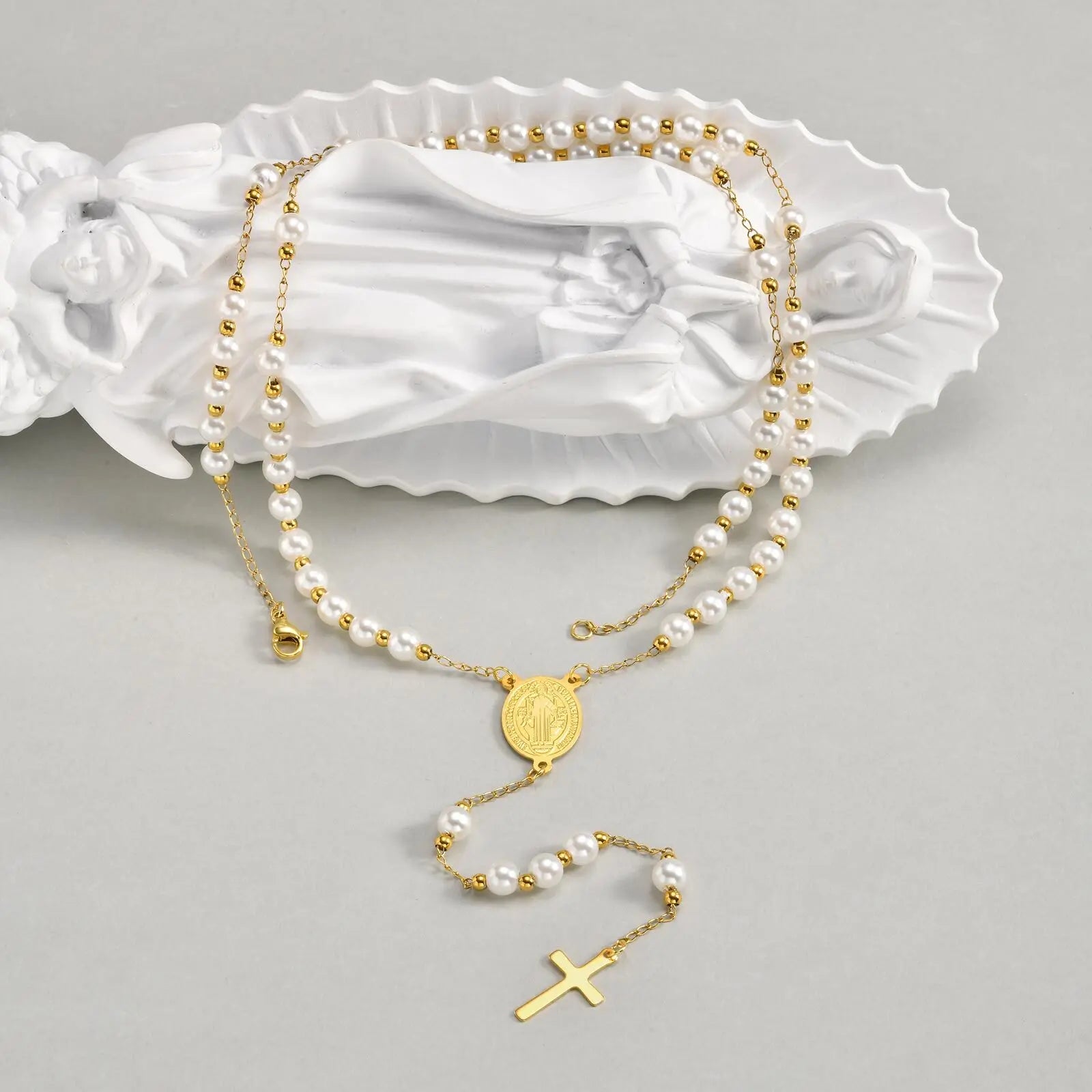 Collier croix perle